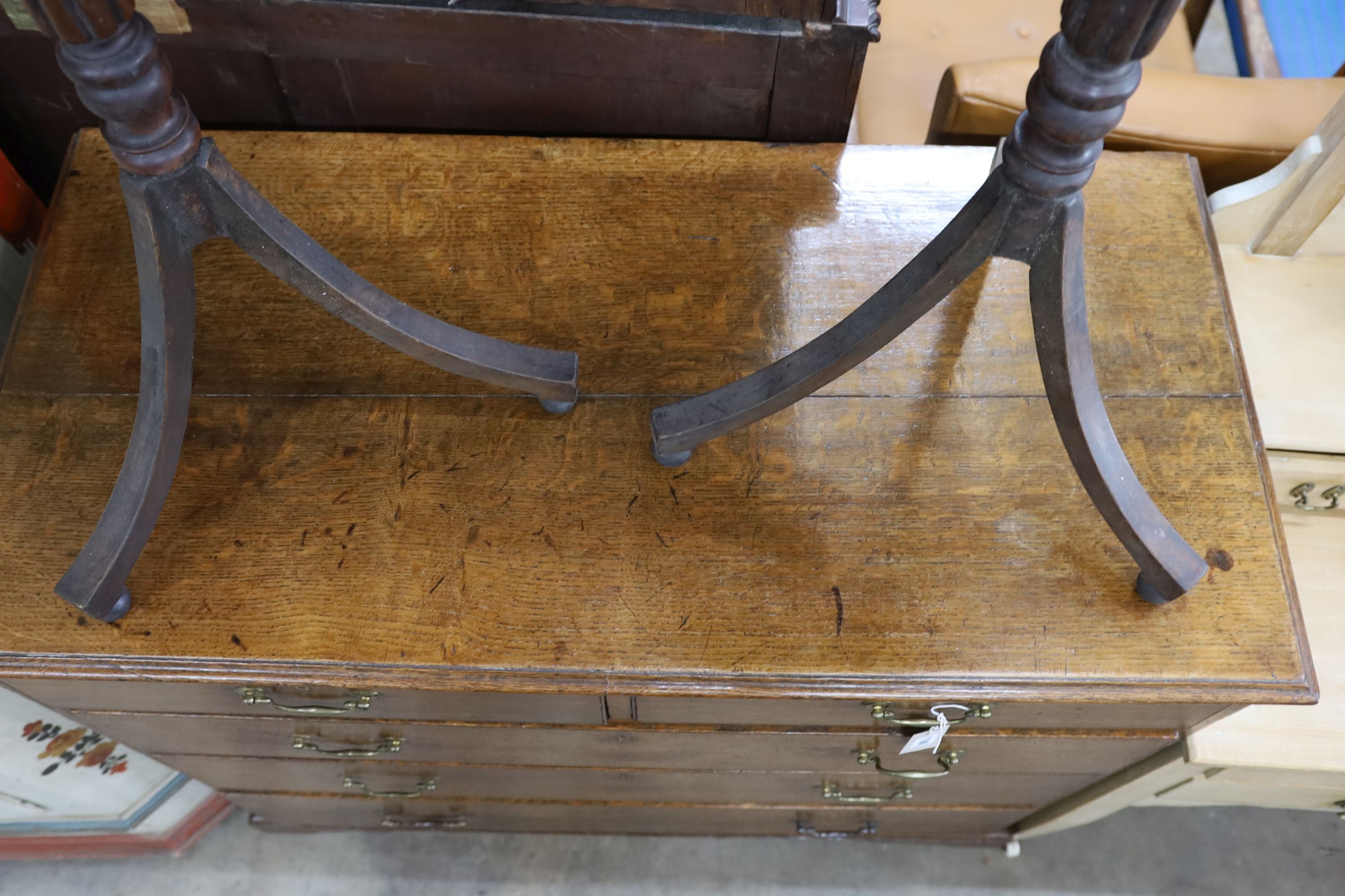 A George III provincial oak chest of two short and three long drawers, width 108cm, depth 52cm, height 98cm